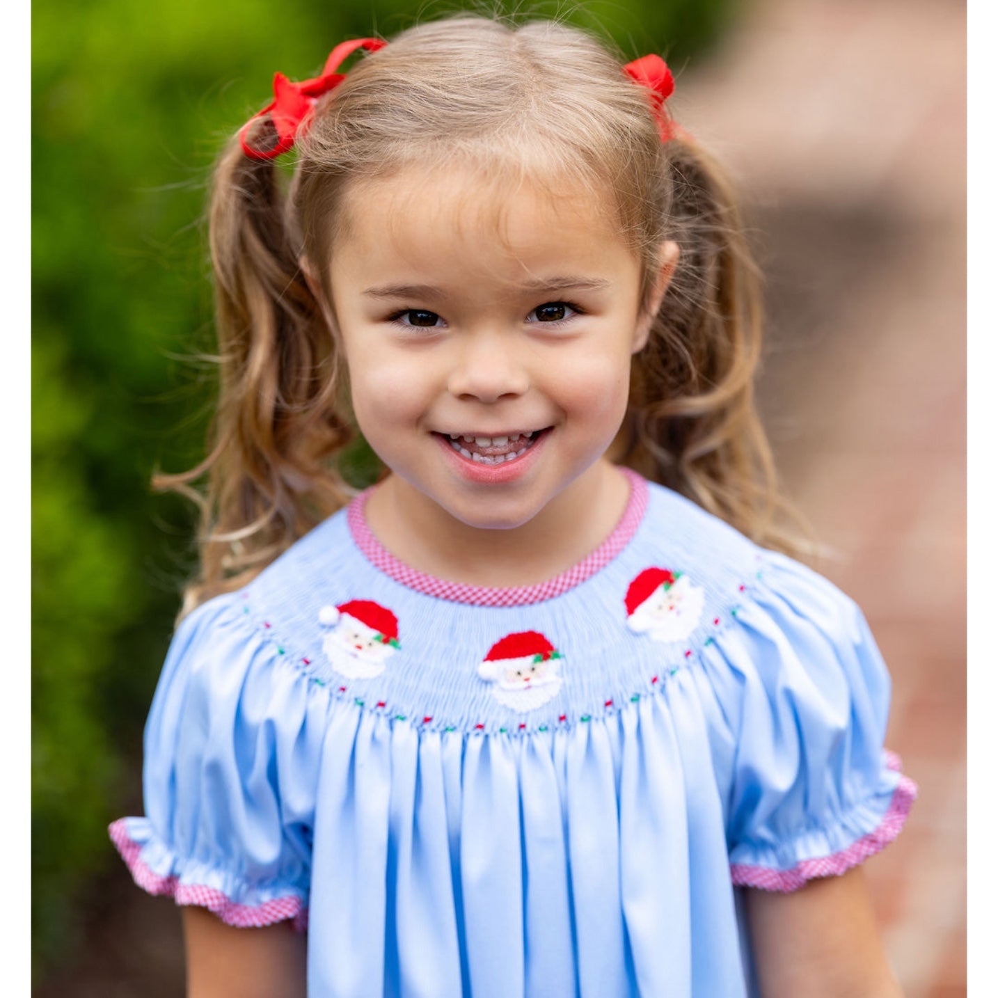 Blue Smocked Santa Bishop